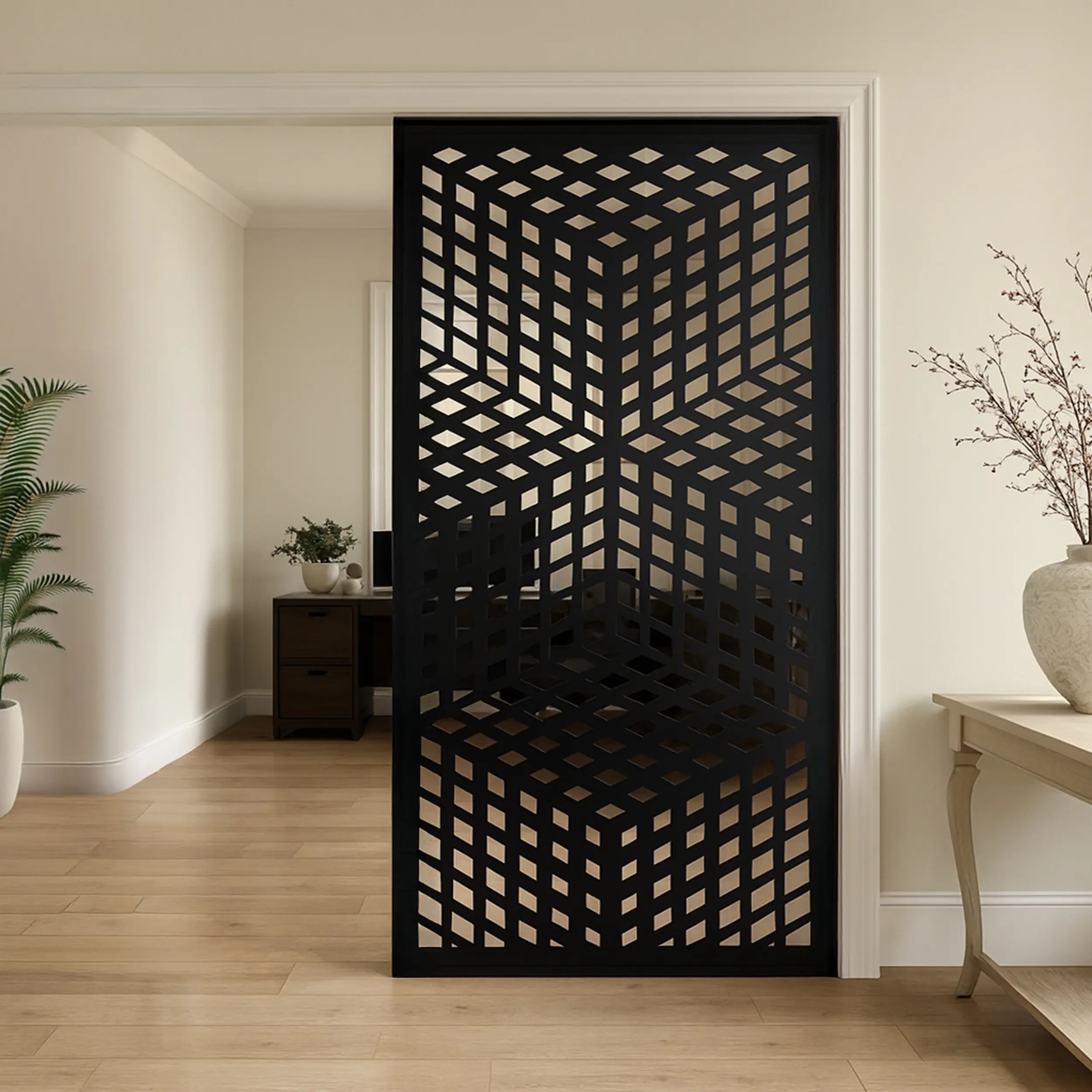 Decorative black screen with geometric pattern in a room setting